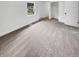 Bedroom featuring plush carpeting, neutral decor, and ample closet space at 9490 E 36Th Pl, Indianapolis, IN 46235