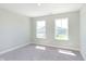 Neutral bedroom featuring two windows allowing for an abundance of natural light at 9570 Beckett St, Avon, IN 46123