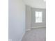 Neutral bedroom showcasing a window with an outside view at 9570 Beckett St, Avon, IN 46123