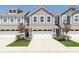 Inviting exterior of a two-story home featuring a two-car garage and well-maintained landscaping at 9570 Beckett St, Avon, IN 46123