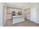 Contemporary kitchen featuring a center island, stainless steel appliances, and stylish finishes at 9570 Beckett St, Avon, IN 46123