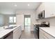 Stylish kitchen featuring an island sink, stainless steel appliances, and an open layout at 9570 Beckett St, Avon, IN 46123