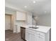 Kitchen island with stainless steel dishwasher and sink at 9583 Beckett St, Avon, IN 46123