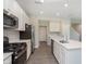 Bright kitchen featuring stainless steel appliances and an island at 9583 Beckett St, Avon, IN 46123