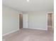 This is a bright bedroom with carpet, multiple doors, and walk-in shower in attached bathroom at 9604 Beckett St, Avon, IN 46123