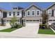 Charming townhome with attached two-car garage and manicured front lawn at 9604 Beckett St, Avon, IN 46123