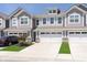 Charming townhome with a two-car garage, well-maintained landscaping, and inviting curb appeal at 9652 Beckett St, Avon, IN 46123