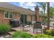 Inviting backyard deck featuring comfortable seating, a grill, and outdoor lighting at 9885 Oakleaf Way, McCordsville, IN 46055