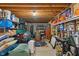 Unfinished basement with exposed wood ceiling and a collection of sports memorabilia at 9885 Oakleaf Way, McCordsville, IN 46055