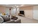 Finished basement with a large sectional sofa and entertainment area at 9885 Oakleaf Way, McCordsville, IN 46055