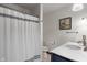 Bathroom featuring a shower with a white curtain, toilet, and vanity at 9885 Oakleaf Way, McCordsville, IN 46055