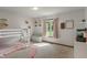 Charming ' bedroom with bunk beds and a cozy window bench, creating a playful atmosphere at 9885 Oakleaf Way, McCordsville, IN 46055