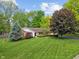 Charming single-story home with manicured lawn, mature trees, and inviting curb appeal in a serene setting at 9885 Oakleaf Way, McCordsville, IN 46055