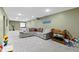 Basement featuring a projector screen and projector, toys, and a comfortable sofa at 11872 Traymoore Dr, Fishers, IN 46038