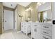 Bright bathroom with double vanity sinks, modern fixtures, and a neutral color scheme at 11872 Traymoore Dr, Fishers, IN 46038