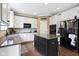 Kitchen featuring granite countertops, stainless steel appliances, and an island at 11872 Traymoore Dr, Fishers, IN 46038