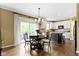 Bright eat-in kitchen featuring stainless steel appliances, white cabinetry, and a center island at 11872 Traymoore Dr, Fishers, IN 46038