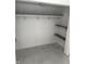 Spacious closet with shelving and bar and marble tile flooring offer plenty of storage space at 1322 S Belmont Ave, Indianapolis, IN 46221