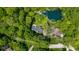 Aerial view of property showing approximate property lines and a small pond on the grounds at 13300 Fairwood Dr, McCordsville, IN 46055