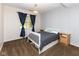 Bedroom with a bed frame that has storage underneath, and a chandelier for light at 13300 Fairwood Dr, McCordsville, IN 46055