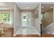 Welcoming foyer with tile floors and a decorative front door at 13300 Fairwood Dr, McCordsville, IN 46055