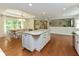 Open kitchen featuring island with granite countertops and cabinetry at 13300 Fairwood Dr, McCordsville, IN 46055