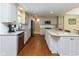 Updated kitchen with granite countertops, stainless appliances and white cabinets at 13300 Fairwood Dr, McCordsville, IN 46055