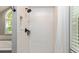 This glass shower stall features subway tile and an arched window at 13300 Fairwood Dr, McCordsville, IN 46055