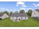 Spacious backyard with a patio area, perfect for outdoor dining and entertaining with ample space for recreation at 1431 Evergreen Dr, Greenfield, IN 46140
