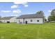 This charming home has a spacious backyard and manicured lawn for relaxing at 1431 Evergreen Dr, Greenfield, IN 46140