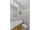 Clean bathroom featuring a sink, toilet, and decorative shower curtain at 1431 Evergreen Dr, Greenfield, IN 46140