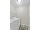 Efficient laundry area equipped with appliances and storage at 1431 Evergreen Dr, Greenfield, IN 46140