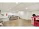 Finished basement with a sectional sofa and playroom at 14638 Deerwood Dr, Carmel, IN 46033