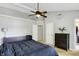 Bedroom with neutral colors, large window, and a ceiling fan at 14638 Deerwood Dr, Carmel, IN 46033