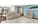 Bright living room featuring cozy seating, a fireplace, and ample natural light at 14638 Deerwood Dr, Carmel, IN 46033