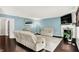 Bright living room featuring cozy seating, a fireplace, and ample natural light at 14638 Deerwood Dr, Carmel, IN 46033