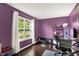 Office area featuring a large window that allows natural light to fill the space and hardwood flooring at 14638 Deerwood Dr, Carmel, IN 46033