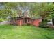 Landscaped home exterior with mature trees and lawn, providing a serene outdoor setting at 1497 Clinton St, Noblesville, IN 46060