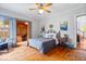 This bedroom features an en-suite study and large windows that let in ample natural light at 1497 Clinton St, Noblesville, IN 46060