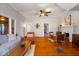 Spacious living room featuring hardwood floors, large windows and a cozy fireplace at 1497 Clinton St, Noblesville, IN 46060