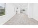 Bright living room with fresh paint, new carpet, and an open layout at 1520 E Kirk St, Muncie, IN 47303