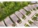 An aerial view showcases houses with well-maintained lawns and mature trees at 16573 Cava Dr, Fishers, IN 46037