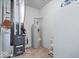 Clean basement area includes a furnace, water heater, and a Frigidaire refrigerator at 16573 Cava Dr, Fishers, IN 46037