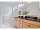 Bathroom with double sinks, granite countertops, and ample lighting for a luxurious feel at 16573 Cava Dr, Fishers, IN 46037