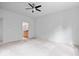 Expansive bedroom featuring a ceiling fan and an adjacent bathroom with great lighting at 16573 Cava Dr, Fishers, IN 46037