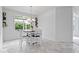 Bright dining area with decorative shelves, a round table, and natural light at 16573 Cava Dr, Fishers, IN 46037