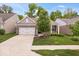 Charming single-Gathering home featuring a manicured lawn, two-car garage, and traditional architecture at 16573 Cava Dr, Fishers, IN 46037