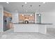 Inviting kitchen features a center island, stainless appliances, and a seamless flow into the adjoining living spaces at 16573 Cava Dr, Fishers, IN 46037