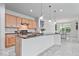 Well-designed kitchen boasting granite countertops, stainless steel appliances, and an open layout at 16573 Cava Dr, Fishers, IN 46037