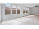 Living room with tile flooring and access to the backyard at 16573 Cava Dr, Fishers, IN 46037